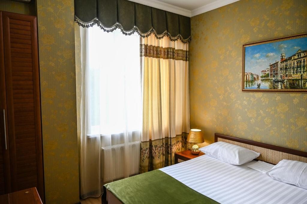 Двухместный (Большой двухместный номер с 1 кроватью или 2 отдельными кроватями) гостевого дома RichMan, Краснодар