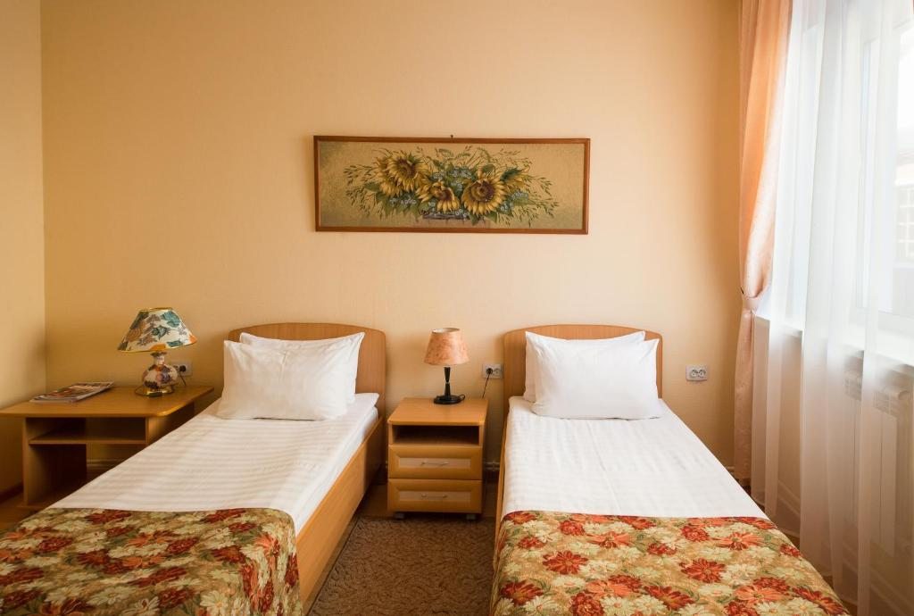 Двухместный (Стандарт Twin с двумя 2-мя раздельными кроватями) мини-отеля Околица, Ижевск