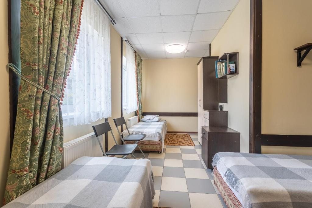 Четырехместный (Стандартный четырехместный номер) отеля Печоры-Парк, Псковская область