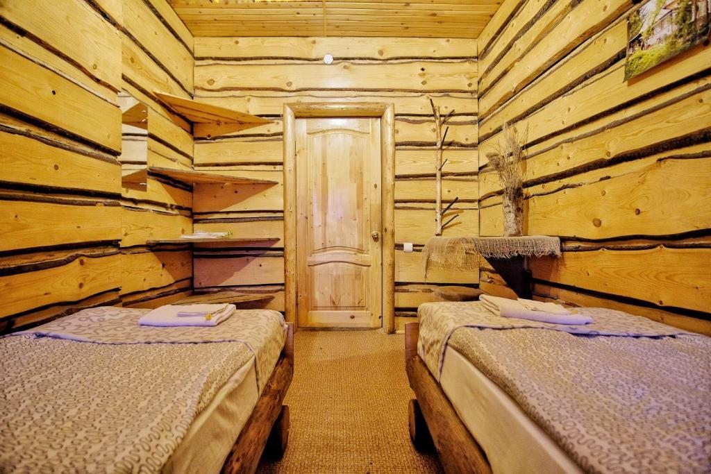 Двухместный (Двухместный номер с 2 отдельными кроватями и общей ванной комнатой) базы отдыха Этно-Усадьба, Трусово