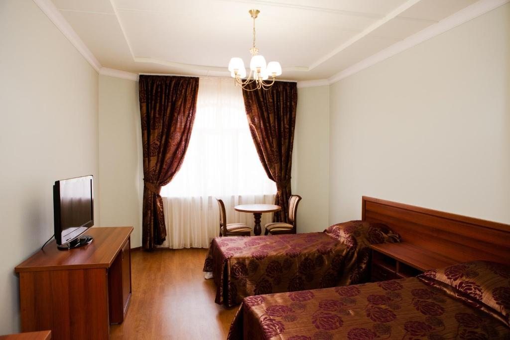 Двухместный (Стандартный двухместный номер с 2 отдельными кроватями) отеля Мальдини, Краснодар