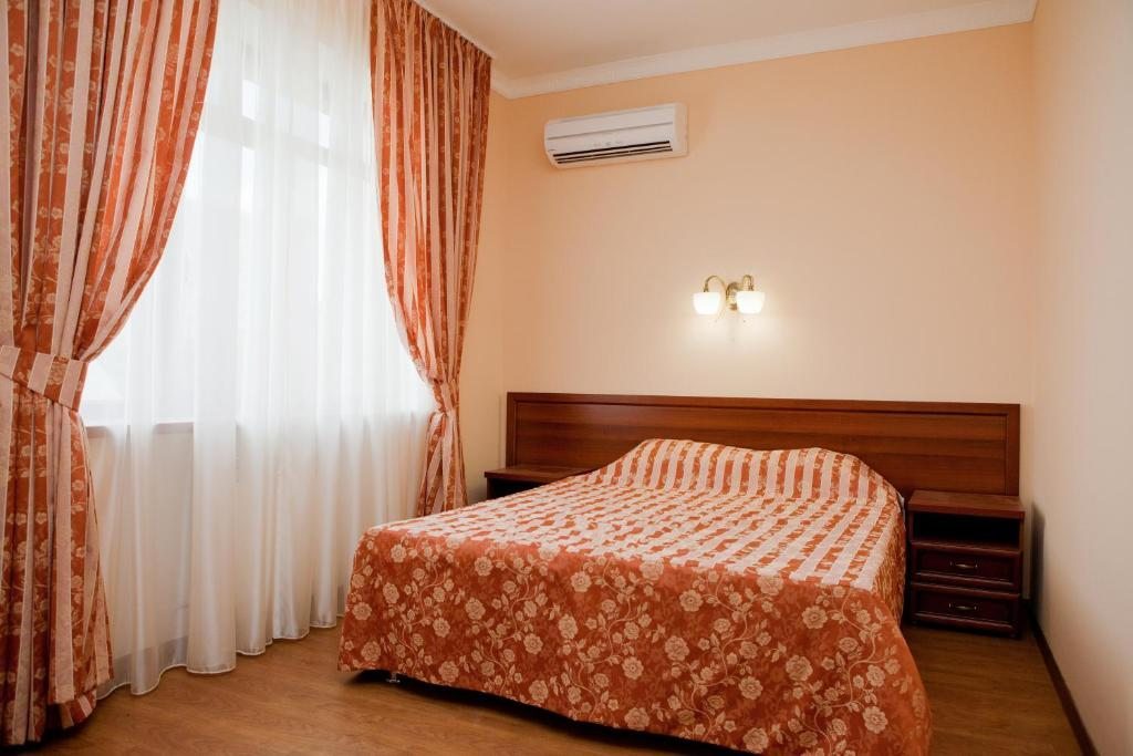 Двухместный (Бюджетный двухместный номер с 1 кроватью) отеля Мальдини, Краснодар