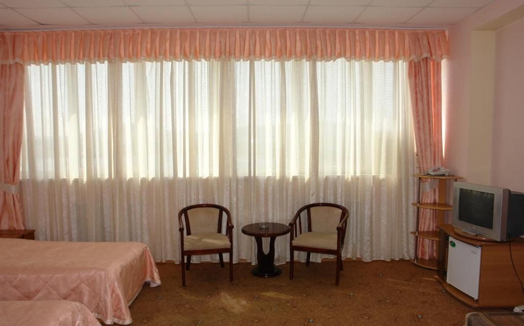 Двухместный (Стандартный двухместный номер с 1 кроватью или 2 отдельными кроватями) отеля Паллада, Славянка