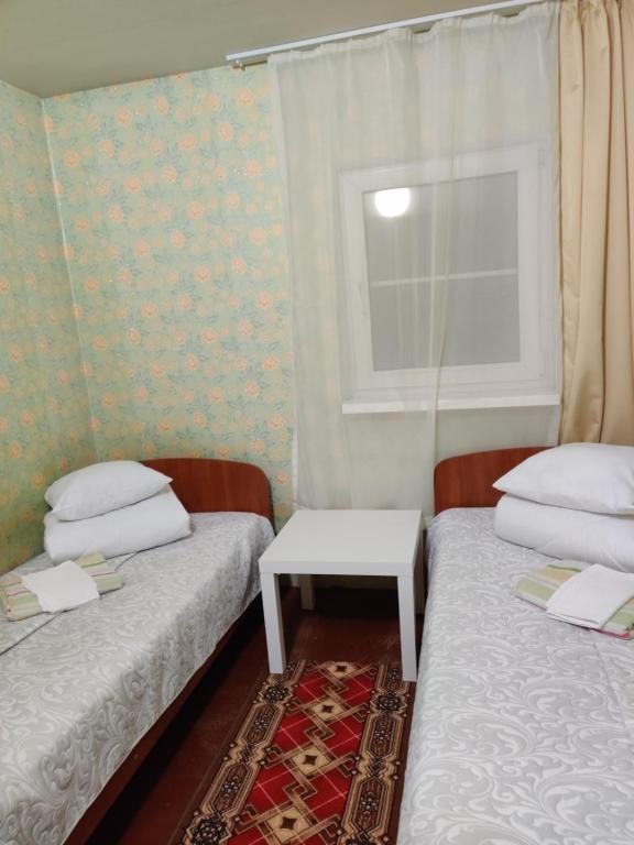 Двухместный (Двухместный номер с 2 отдельными кроватями и видом на горы) гостевого дома Святой источник, Аршан
