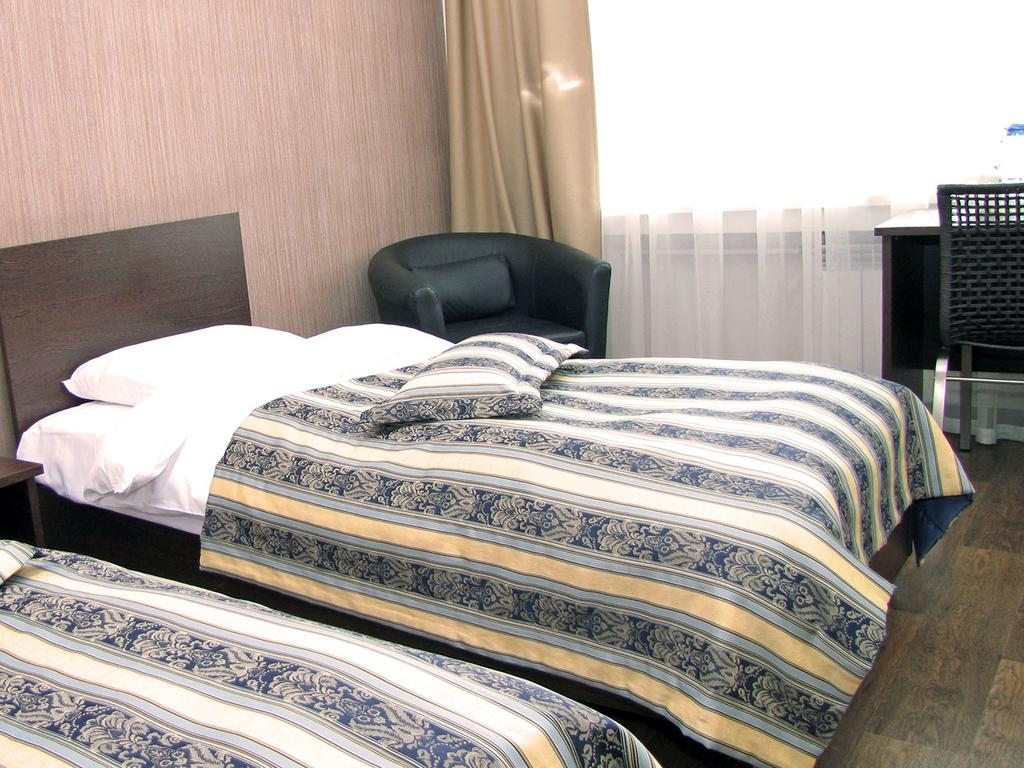 Двухместный (Стандартный двухместный номер с 2 отдельными кроватями) отеля Золотая Долина, Новосибирск