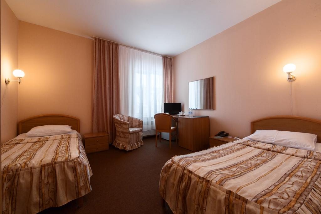 Двухместный (Двухместный номер с 2 отдельными кроватями) гостиницы Биатлонная, Ханты-Мансийск