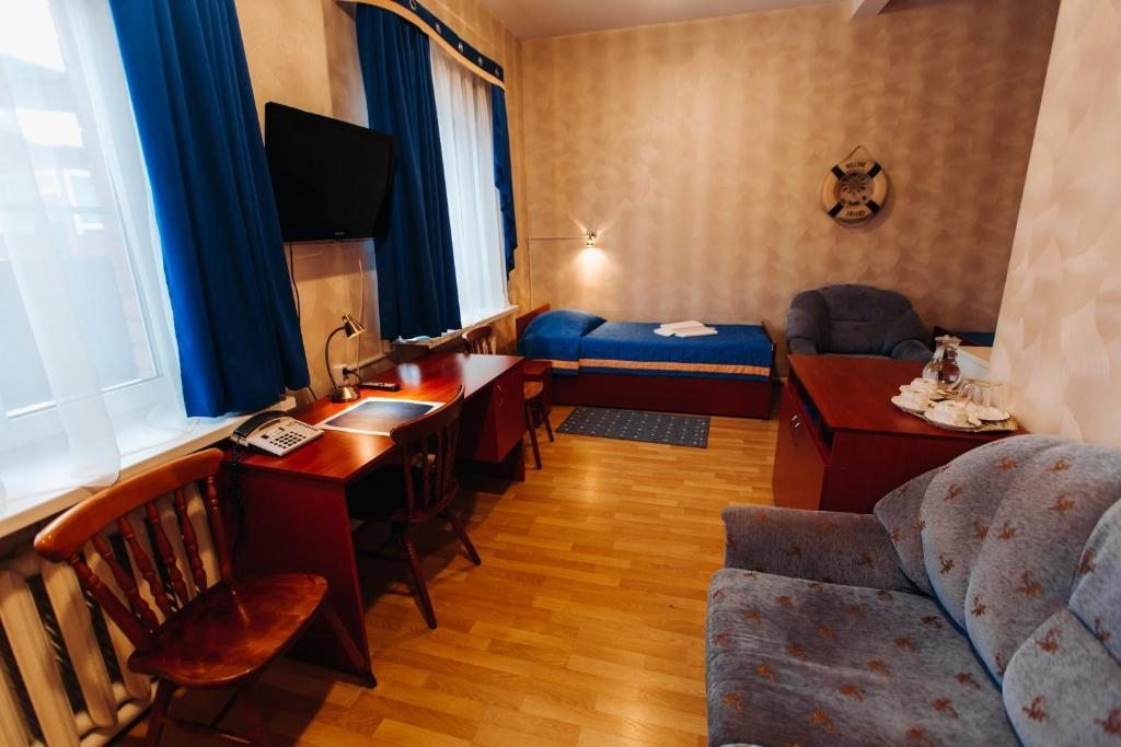 Трехместный (Трехместный номер с основными удобствами) гостиницы Кают Компания, Вельск