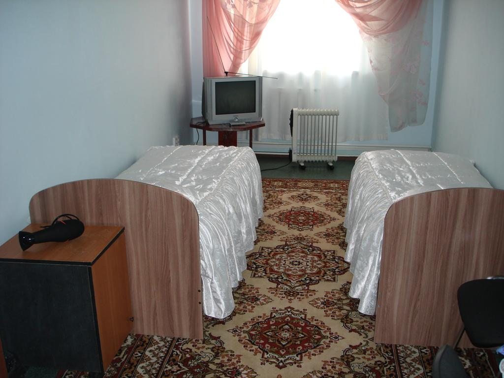 Двухместный (Двухместный номер с 2 отдельными кроватями) мини-отеля Абсолют, Барнаул