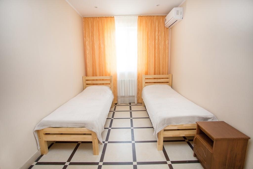Двухместный (Стандартный двухместный номер с 2 отдельными кроватями) мини-отеля Лиманыч, Благовещенская