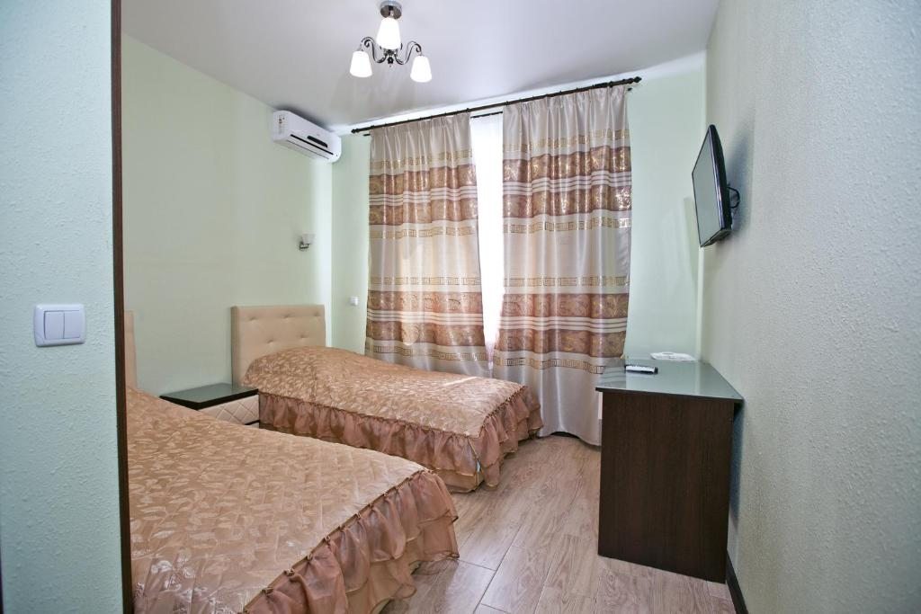 Двухместный (Двухместный номер с 2 отдельными кроватями) отеля Альбатрос, Уссурийск
