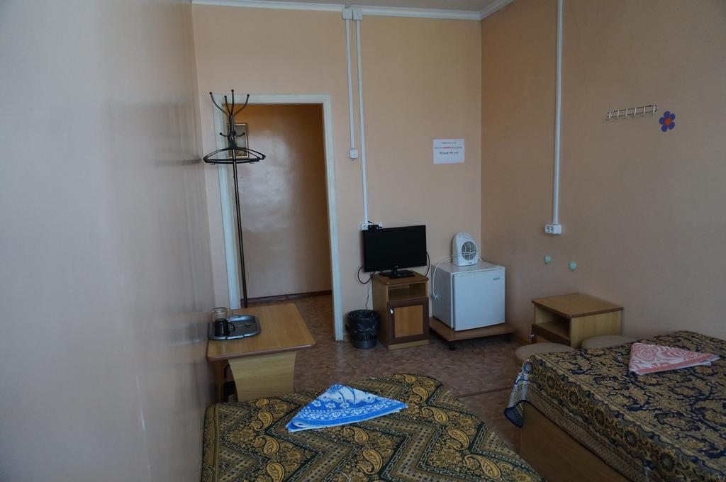 Двухместный (Двухместный номер с 2 отдельными кроватями и общей ванной комнатой) мотеля Блюз, Уссурийск