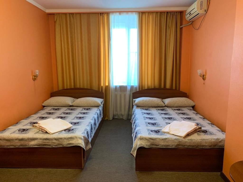 Двухместный (Стандартный двухместный номер с 2 отдельными кроватями) отеля Каньон на Лазо, Хабаровск