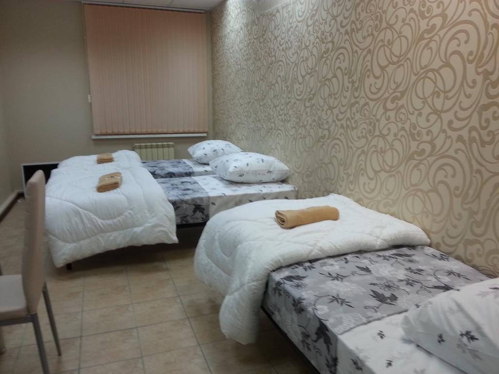 Трехместный (Трехместный номер с общей ванной комнатой) отеля Валенсия, Хабаровск
