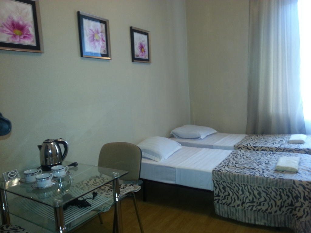Трехместный (Бюджетный трехместный номер с общей ванной комнатой) гостевого дома Валенсия, Хабаровск