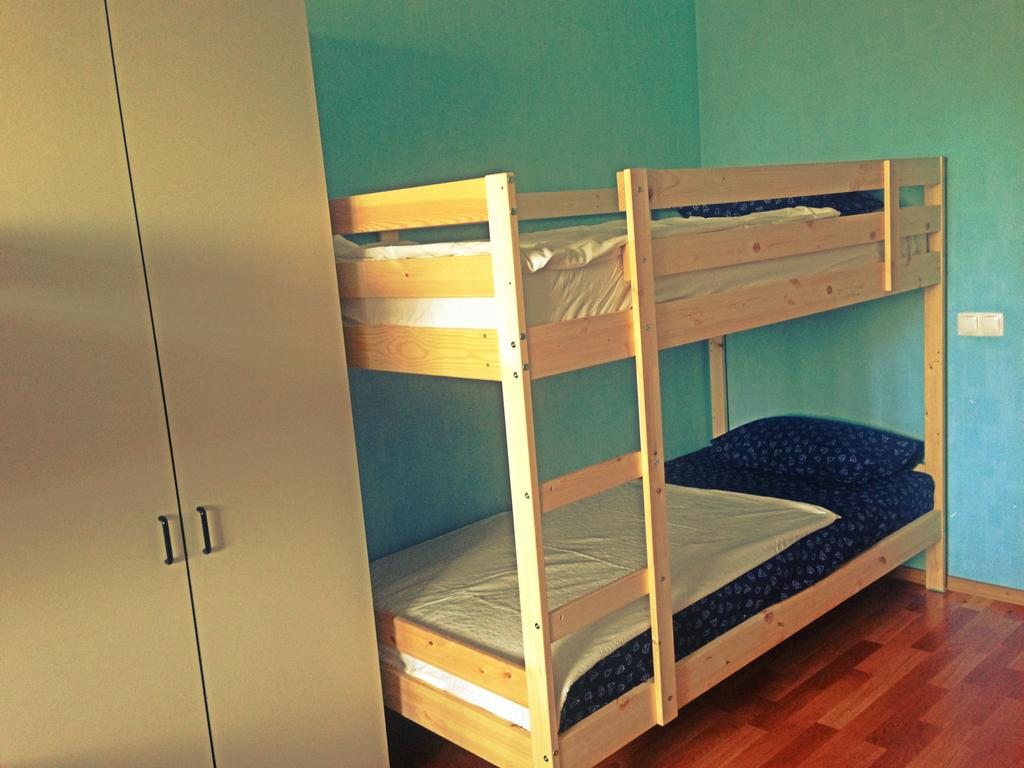Номер (Односпальная кровать в общем номере c 8 кроватями) хостела Гест Хаус, Новосибирск