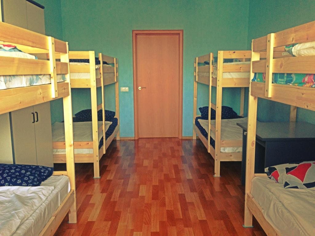 Номер (Односпальная кровать в общем номере c 8 кроватями), Хостел Guest House