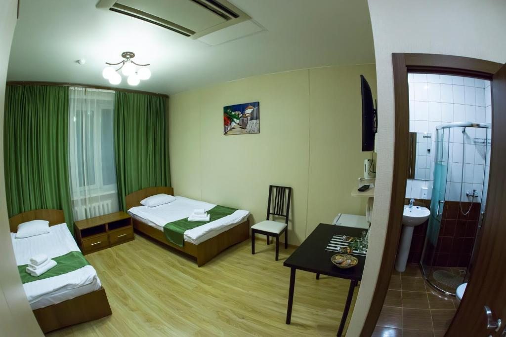 Двухместный (Улучшенный номер с кроватью размера «king-size» или 2 отдельными кроватями) отеля Глобус, Новосибирск