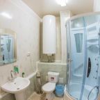 Ванная комната в номере отеля Абзаково Уикенд