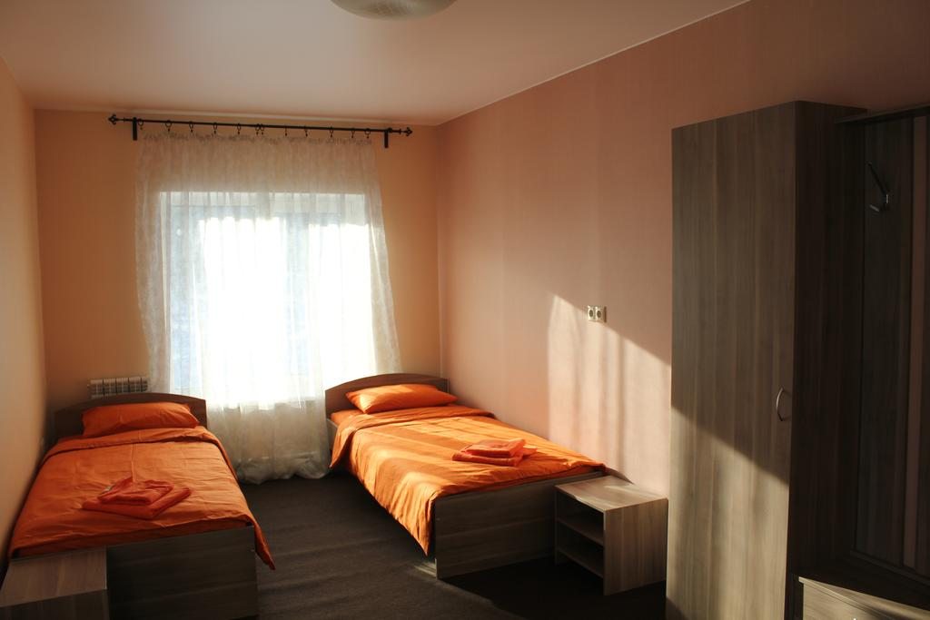 Двухместный (Стандартный двухместный номер с 2 отдельными кроватями и общей ванной комнатой) мини-отеля OxygenRiders, Шерегеш