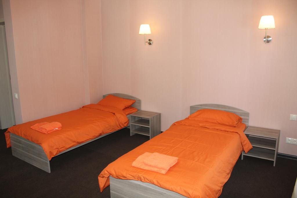 Четырехместный (Четырёхместный номер с отдельной ванной комнатой) мини-отеля OxygenRiders, Шерегеш