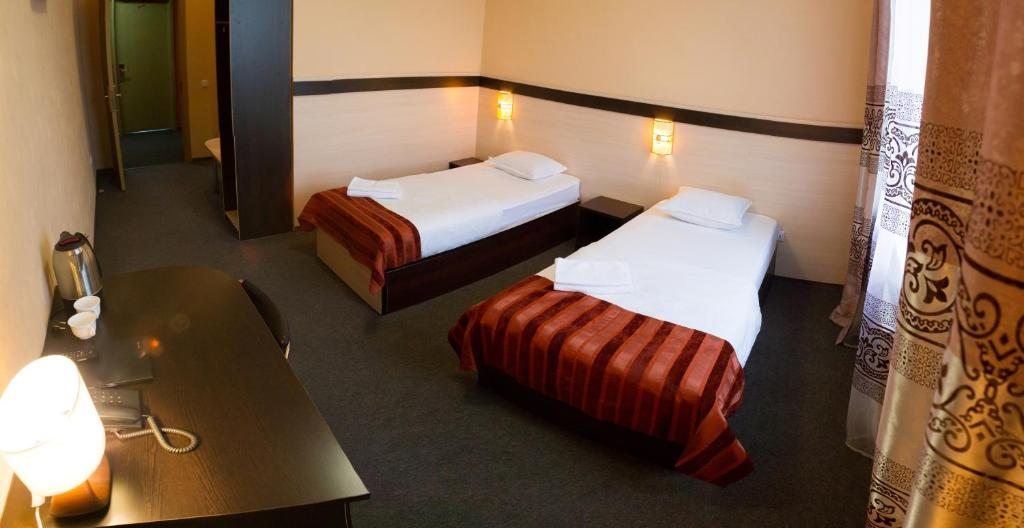 Двухместный (Двухместный номер с 2 отдельными кроватями - Подходит для гостей с ограниченными физическими возможностями) отеля Бизнес Лайф, Улан-Удэ