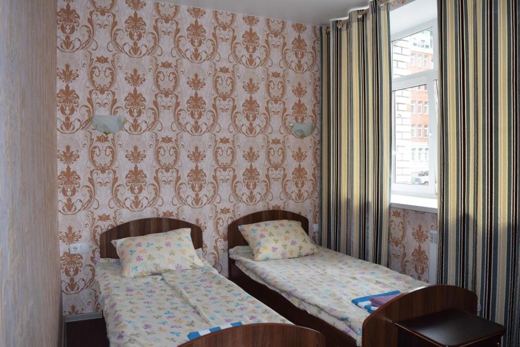 Двухместный (Стандартный двухместный номер с 2 отдельными кроватями) отеля Уютная, Омск