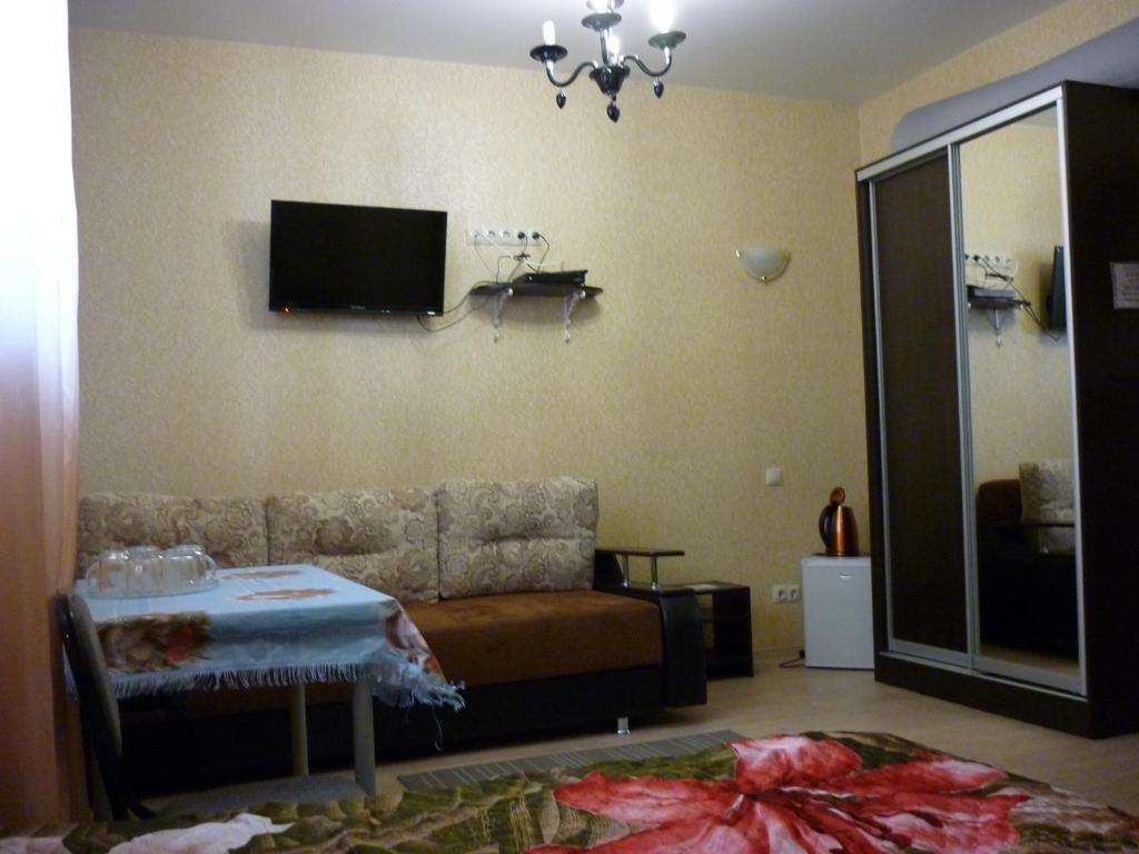 Четырехместный (Стандартный четырехместный номер) гостиницы Райская Лагуна, Омск