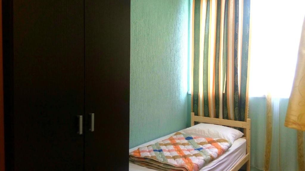 Номер (Односпальная кровать в общем номере для женщин (4 взрослых)) хостела Новый Сочи