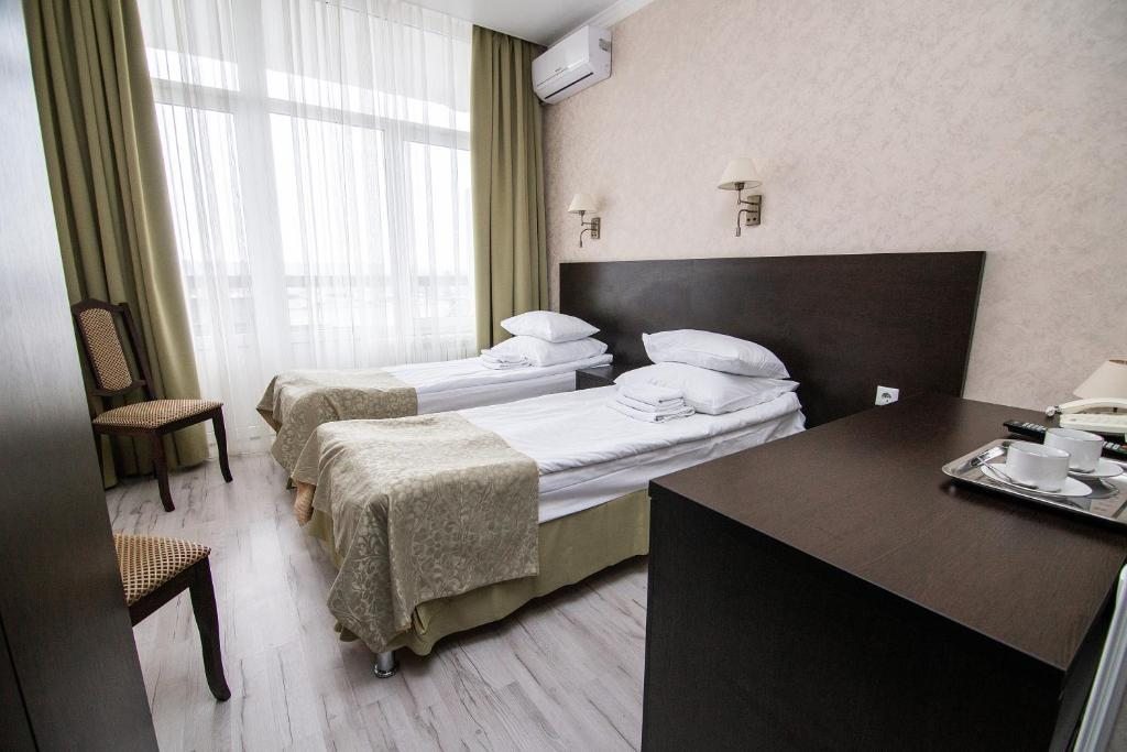 Двухместный (Стандартный двухместный номер с 1 кроватью или 2 отдельными кроватями) отеля Тарханы, Пятигорск