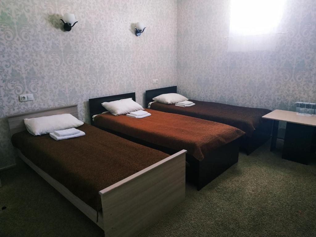 Трехместный (Трехместный номер с 3-мя раздельными кроватями) мини-отеля Гармония, Псков
