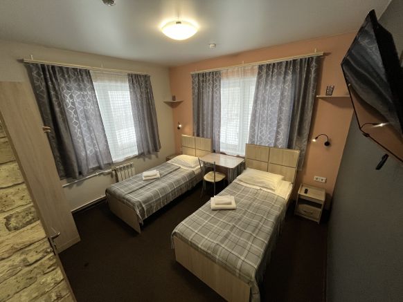 Фотография номера гостиницы Гостиничный комплекс Зима-Лето