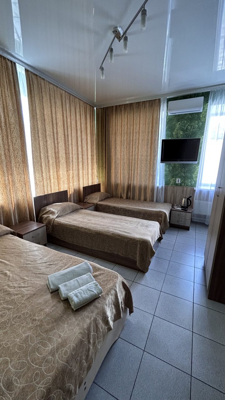 Четырехместный (Четырёхместный номер с раздельными кроватями) отеля Фаворит, Стерлитамак