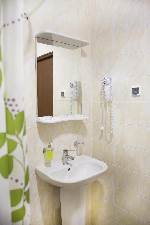 Двухместный (Стандартный двухместный номер с 2 отдельными кроватями и общей ванной комнатой) отеля IlarOtel, Вешки