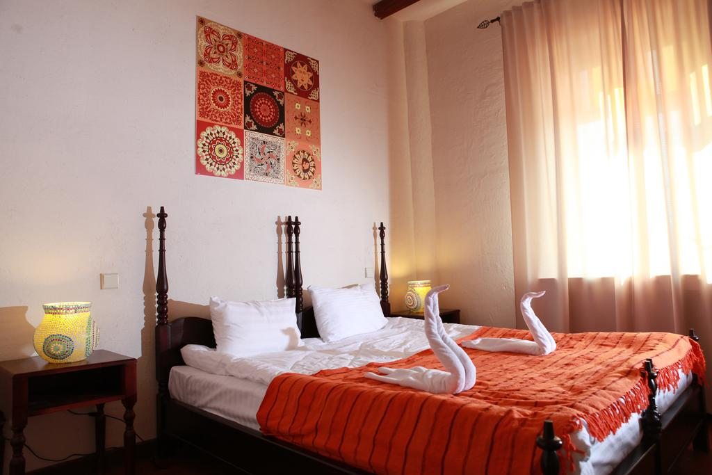 Двухместный (Стандартный двухместный номер с 1 кроватью или 2 отдельными кроватями) отеля Шри-Ланка ЭТНОМИР, Петрово
