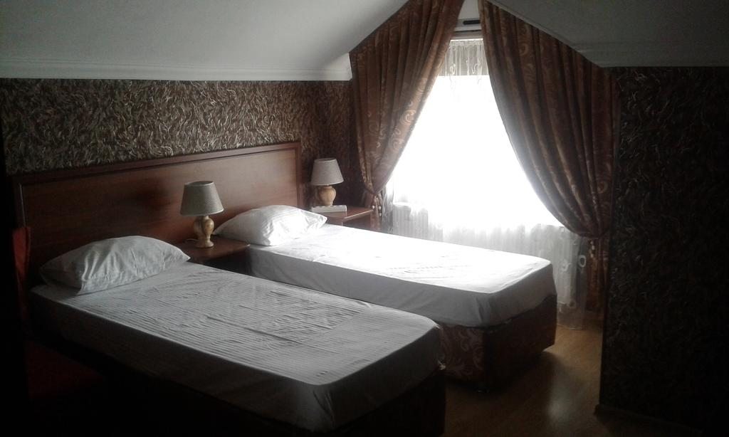 Двухместный (Стандартный двухместный номер с 2 отдельными кроватями) мини-отеля 5 сезонов, Кущёвская