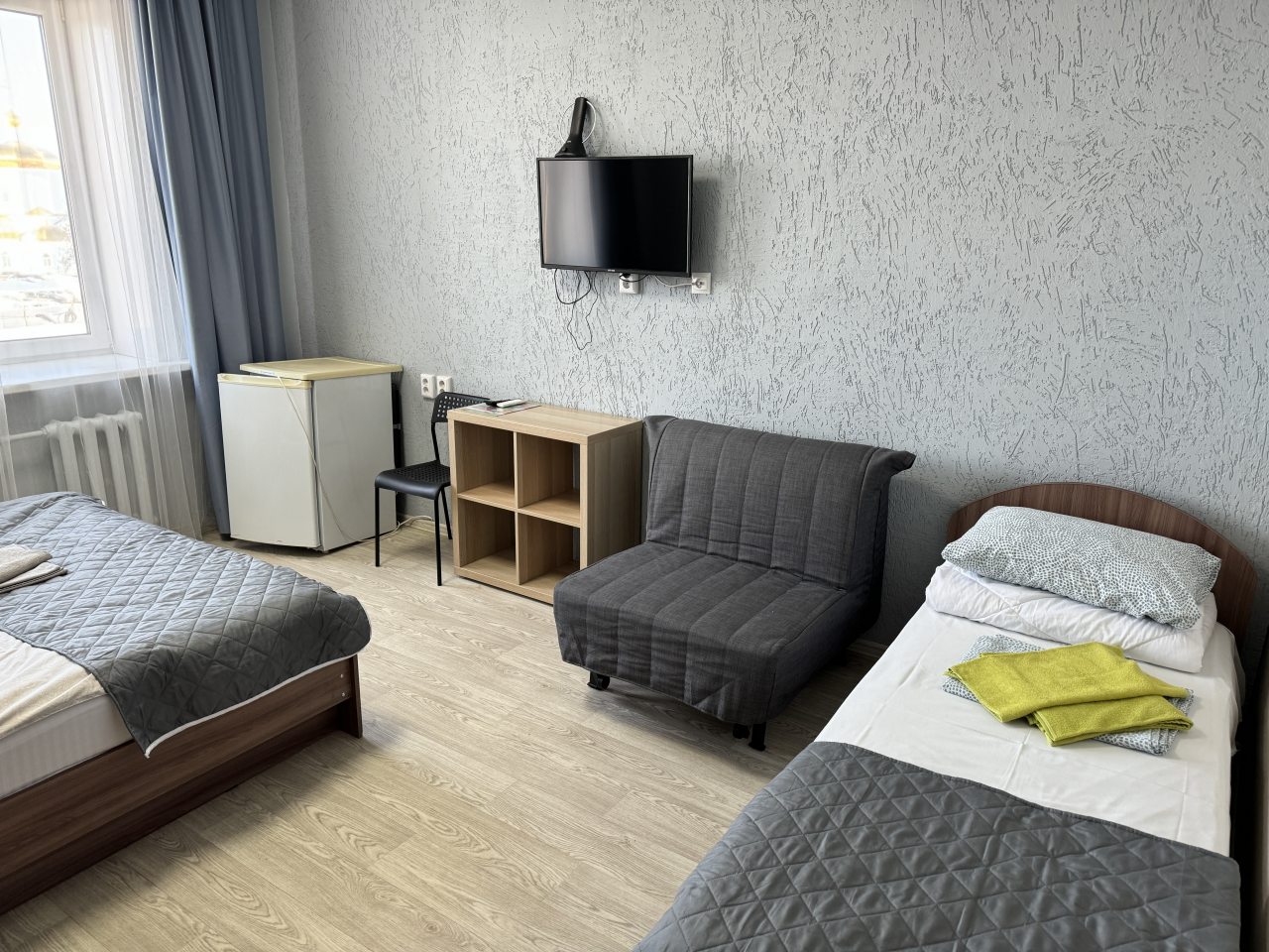 Стандартный трехместный номер с ванной комнатой