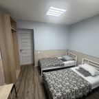 Четырехместный номер с общей ванной комнатой на мансарде