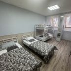 Четырехместный номер с общей ванной комнатой на мансарде