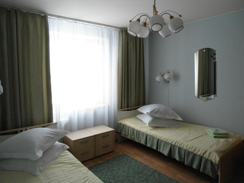 Двухместный (Двухместный номер с 2 отдельными кроватями и общей ванной комнатой) гостиницы Светлица, Удомля