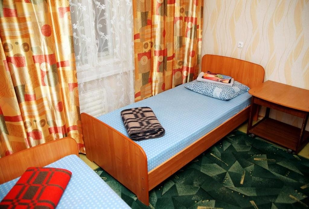 Номер (Кровать в общем номере для мужчин) апартамента Уютный Дом 32, Усинск