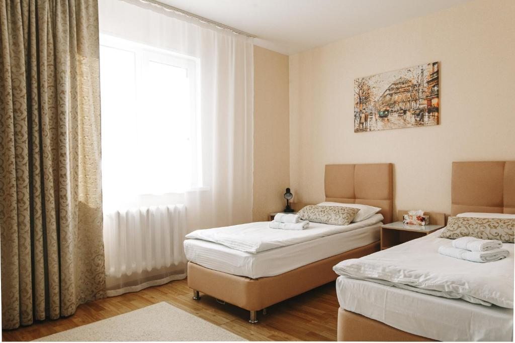 Двухместный (Стандартный двухместный номер с 2 отдельными кроватями) гостиницы Дилижанс, Чайковский