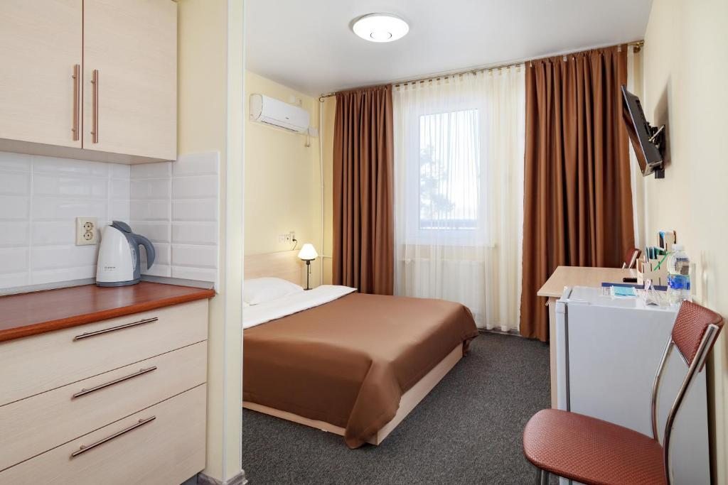 Двухместный (Стандартный двухместный номер с 1 кроватью) курортного отеля Манжерок