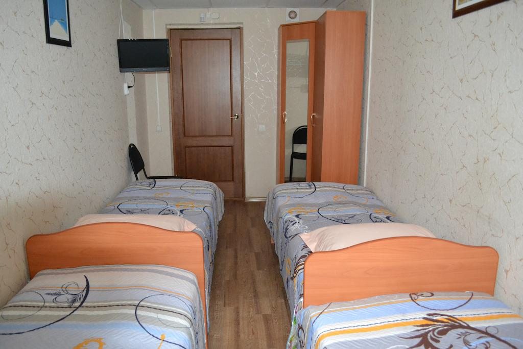 Четырехместный (Четырехместный номер эконом-класса с общей ванной комнатой) отеля Гайва, Пермь