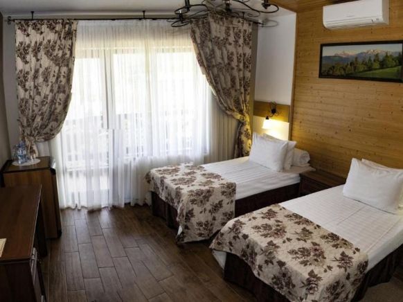 Фотография номера гостевого дома Куршевель