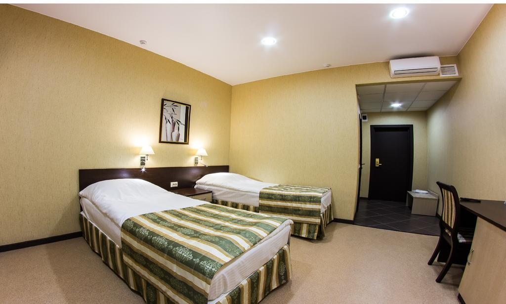 Двухместный (Бюджетный двухместный номер с 2 отдельными кроватями) гостиницы Касимов
