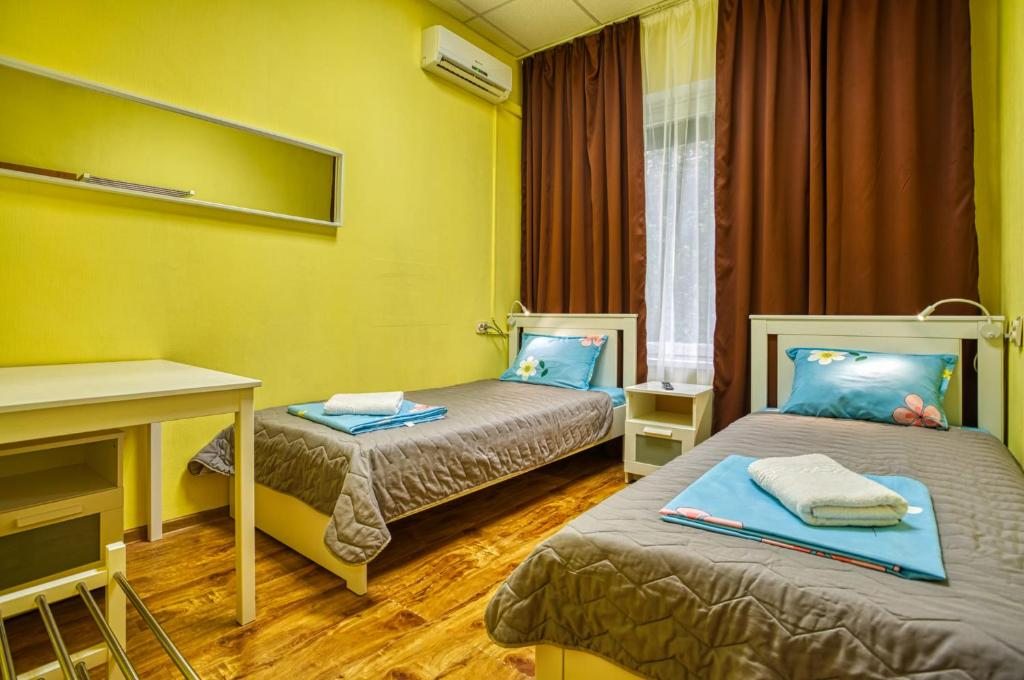 Двухместный (Двухместный номер с 2 отдельными кроватями и общей ванной комнатой) мини-отеля Ладомир в Филях, Москва