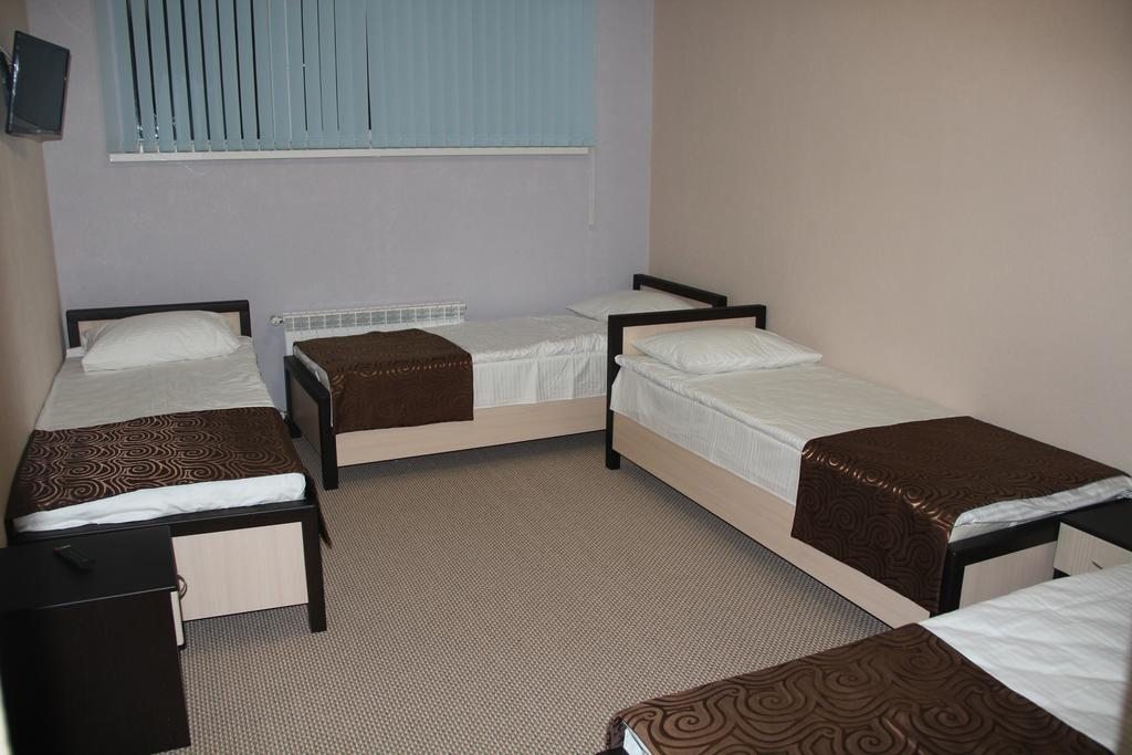 Двухместный (Бюджетный двухместный номер с 2 отдельными кроватями) отеля Смайл, Терскол