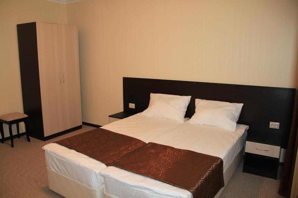 Двухместный (Стандартный двухместный номер с 2 отдельными кроватями) отеля Смайл, Терскол