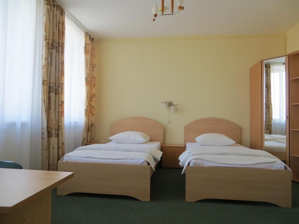 Двухместный (Двухместный 1 категории стандартный с двумя раздельными кроватями) отеля Корона, Самара