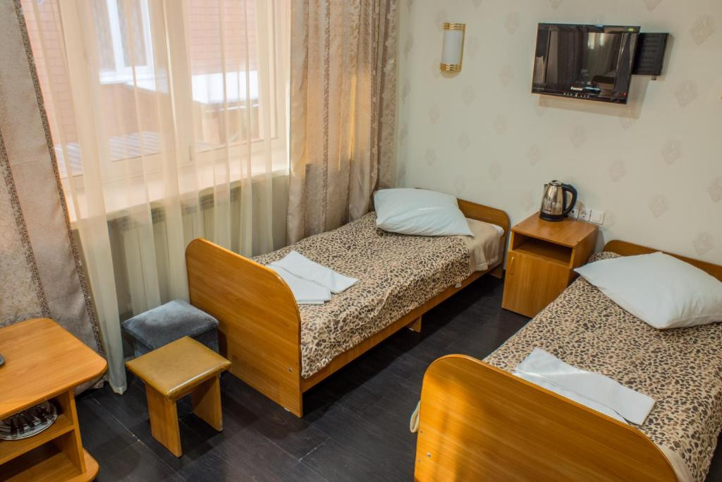 Трехместный (Трехместный (3 койкоместа)) гостиницы Магас, Иркутск